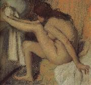 Edgar Degas Naked  woman wiping toes oil